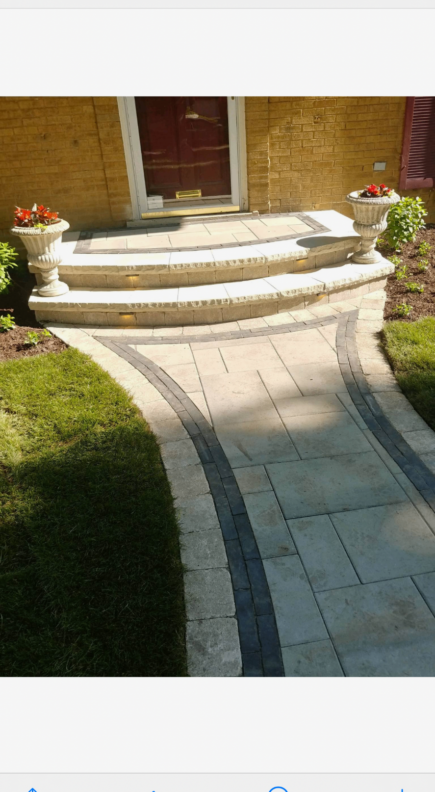 Front entry walkway with stone steps and lighting